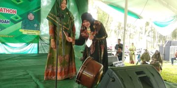 Nyonya Murwati Suparyono S.IP.MM Membuka Lomba Lagu Mars NU Dan Syubbanul Wathon PAC Muslimat Se-kecematan Trimurjo Kabupaten Lampung Tengah